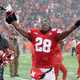 Running back Maurice Washington #28 of the Nebraska Cornhuskers celebrates the win against the Michigan State Spartans at Memorial Stadium on November 17, 2018 in Lincoln, Nebraska.